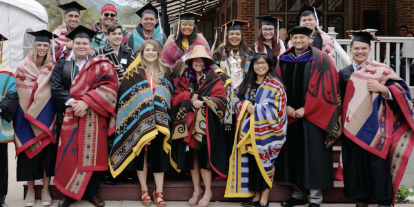 Group of indigenous and native students in traditional garb