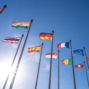 international flags and a blue sky