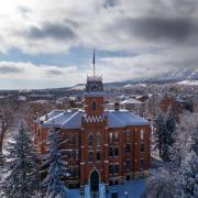 Old Main building covered in snow